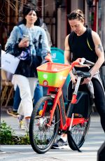 MELANIE CHISHOLM Out for a Bike Ride in London 03/23/2022