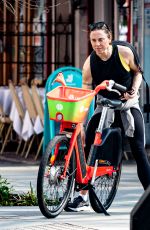 MELANIE CHISHOLM Out for a Bike Ride in London 03/23/2022