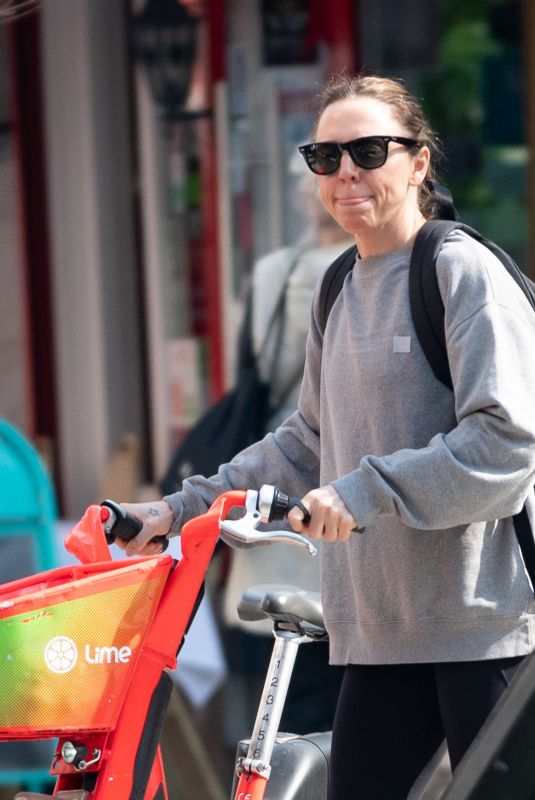 MELANIE CHISHOLM Out for a Bike Ride in London 03/23/2022