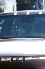 MILA KUNIS and Ashton Kutcher Out in His Electric Hummer in Los Angeles 03/14/2022