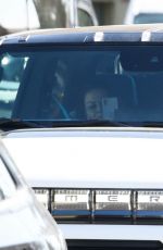 MILA KUNIS and Ashton Kutcher Out in His Electric Hummer in Los Angeles 03/14/2022