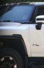 MILA KUNIS and Ashton Kutcher Out in His Electric Hummer in Los Angeles 03/14/2022