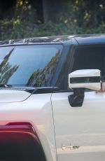 MILA KUNIS and Ashton Kutcher Out in His Electric Hummer in Los Angeles 03/14/2022