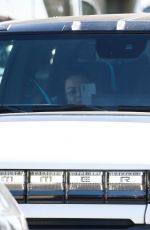 MILA KUNIS and Ashton Kutcher Out in His Electric Hummer in Los Angeles 03/14/2022