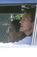 MILA KUNIS and Ashton Kutcher Out in His Electric Hummer in Los Angeles 03/14/2022