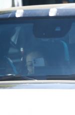 MILA KUNIS and Ashton Kutcher Out in His Electric Hummer in Los Angeles 03/14/2022