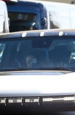 MILA KUNIS and Ashton Kutcher Out in His Electric Hummer in Los Angeles 03/14/2022