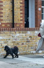 NADIA ESSEX Out with Het Dog in London 03/29/2022