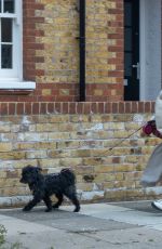 NADIA ESSEX Out with Het Dog in London 03/29/2022