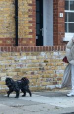 NADIA ESSEX Out with Het Dog in London 03/29/2022