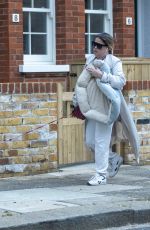 NADIA ESSEX Out with Het Dog in London 03/29/2022