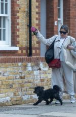 NADIA ESSEX Out with Het Dog in London 03/29/2022