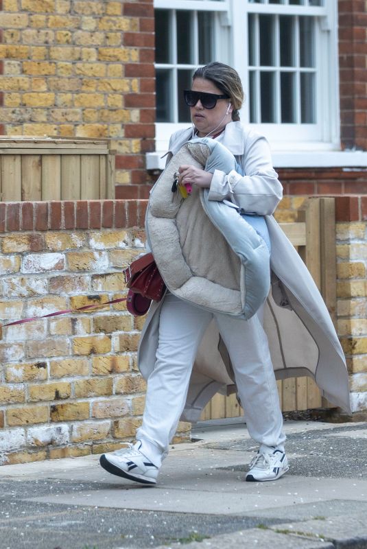 NADIA ESSEX Out with Het Dog in London 03/29/2022