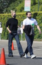 NICOLA PELTZ and Brooklyn Beckham Out at Beverly Hills Farmers Market 03/13/2022