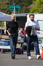 NICOLA PELTZ and Brooklyn Beckham Out at Beverly Hills Farmers Market 03/13/2022