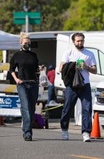 NICOLA PELTZ and Brooklyn Beckham Out at Beverly Hills Farmers Market 03/13/2022