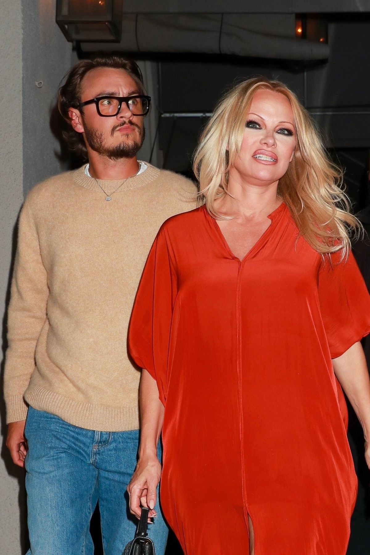 PAMELA ANDERSON and Brandon Lee at Craig’s in West Hollywood 03/06/2022.