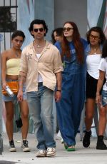 Pregnant SOPHIE TURNER Out and About in Miami 02/28/2022