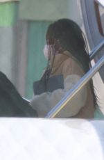 SANDRA BULLOCK Touches Down in Los Angeles 03/20/2022