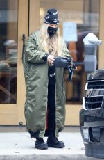 STACY FERGIE FERGUSON Feeds a Parking Meter in Los Angeles 01/19/2022