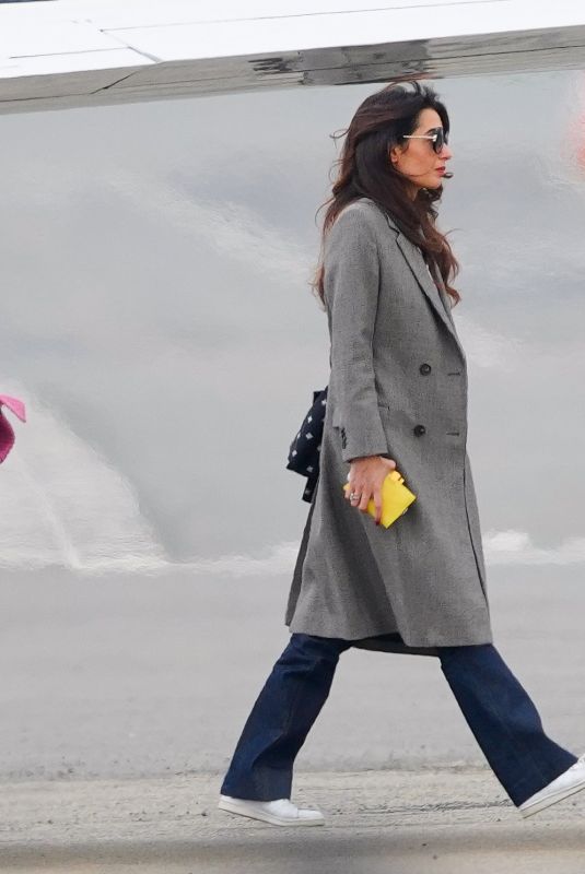 AMAL CLOONEY Arrives at Teterboro Airport in New Jersey 04/26/2022