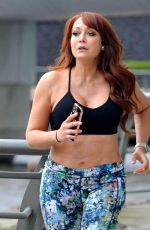 AMY ANZEL Works Out Around Media City in Manchester 04/26/2022