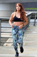 AMY ANZEL Works Out Around Media City in Manchester 04/26/2022
