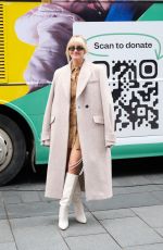 ASHLEY ROBERTS at Lets Raise It Up Charity Bus in Leicester Square in London 04/08/2022