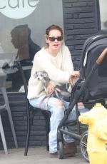 ASHLEY TISDALE and Christopher French Out with Her Baby at Mustard Seed Cafe in Los Feliz 04/03/2022