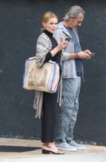 BELINDA CARLISLE Waiting for Her Ride in West Hollywood 04/02/2022
