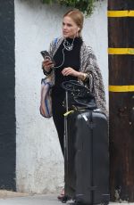 BELINDA CARLISLE Waiting for Her Ride in West Hollywood 04/02/2022