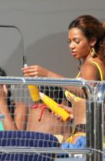 BEYONCE in a Yellow Bikini at a Yacht in Monaco 05/15/2007