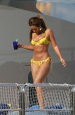 BEYONCE in a Yellow Bikini at a Yacht in Monaco 05/15/2007