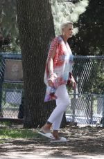 BRIGITTE NIELSEN and Mattia Dessi at a Park in Los Angeles 04/10/2022