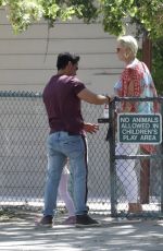 BRIGITTE NIELSEN and Mattia Dessi at a Park in Los Angeles 04/10/2022