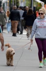 BUSY PHILIPPS Out with Her Dog in New York 04/25/2022