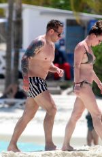 CANDICE BROWN in Bikini at a Beach in Cancun 04/10/2022