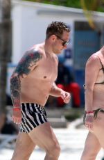 CANDICE BROWN in Bikini at a Beach in Cancun 04/10/2022
