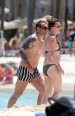 CANDICE BROWN in Bikini at a Beach in Cancun 04/10/2022