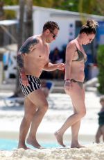 CANDICE BROWN in Bikini at a Beach in Cancun 04/10/2022