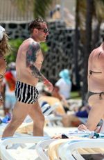 CANDICE BROWN in Bikini at a Beach in Cancun 04/10/2022