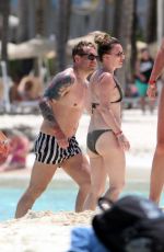 CANDICE BROWN in Bikini at a Beach in Cancun 04/10/2022