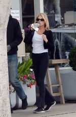 CHARLOTTE MCKINNEY and Nathan Kostechko Out in Los Angeles 04/08/2022