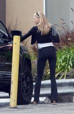 CHARLOTTE MCKINNEY and Nathan Kostechko Out in Los Angeles 04/08/2022