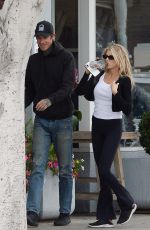 CHARLOTTE MCKINNEY and Nathan Kostechko Out in Los Angeles 04/08/2022