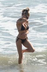 CHARLOTTE MCKINNEY in Bikini at a Beach in Santa Monica 04/24/2022