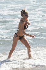 CHARLOTTE MCKINNEY in Bikini at a Beach in Santa Monica 04/24/2022