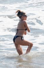 CHARLOTTE MCKINNEY in Bikini at a Beach in Santa Monica 04/24/2022