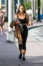 CHRISSY TEIGEN Out for Lunch with a Friend in Miami 03/31/2022