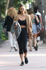 CHRISSY TEIGEN Out for Lunch with a Friend in Miami 03/31/2022